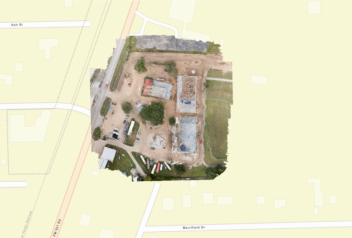 Construction orthomosaic showing a full project site in map context